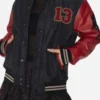 Halloween Friday The 13th Varsity Jacket crafted with a stylish letterman-inspired construction, eerie graphics, and contemporary horror streetwear appeal.