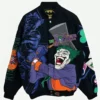 The Joker Batman Bomber Jacket featuring bold Joker and Batman-inspired graphics, a classic bomber silhouette, and edgy superhero styling.